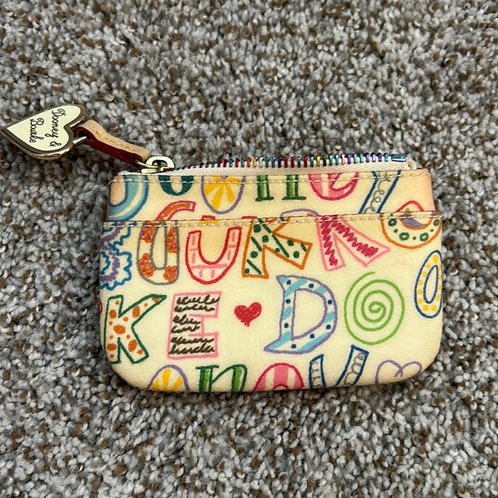 Dooney and Burke multicolor coin purse; heavy patina